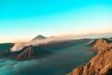 Beautiful colorful sunrise over Mount Bromo and wild island in Mount Bromo National Park