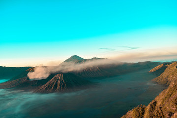 Beautiful colorful sunrise over Mount Bromo and wild island in Mount Bromo National Park