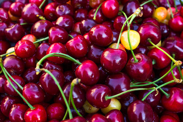  background of Fresh cherries  on wooden background.