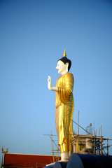 Repairing the Buddha at Chiang mai temple Thailand.