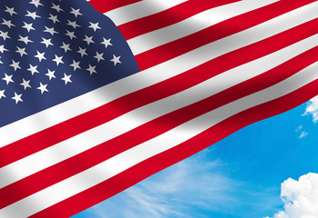 Fototapeta premium USA flag at blue sky clouds