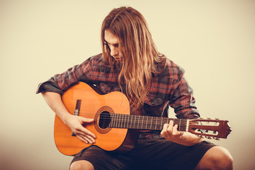 Fototapeta premium Guitarist is playing the guitar.