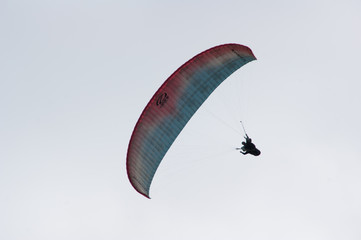 Two paragliders flying in the same paraglide in the south of Iceland