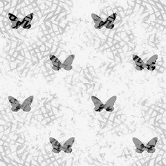 Abstract pattern of butterflies. Seamless black and white texture.
