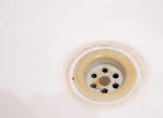 Bathroom bathtub drain sink hole old with copyspace