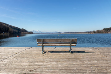 bench at the wallersee in austria