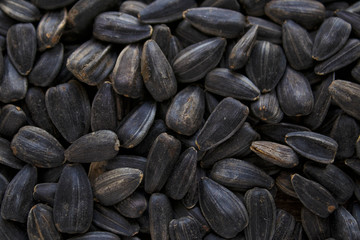 Fototapeta na wymiar Black sunflower seeds. For texture or background