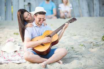 Young couple with a guitar