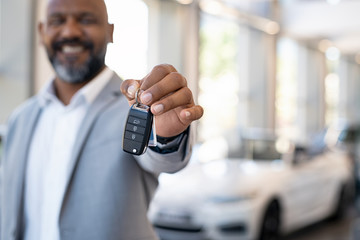 Sales man with car keys