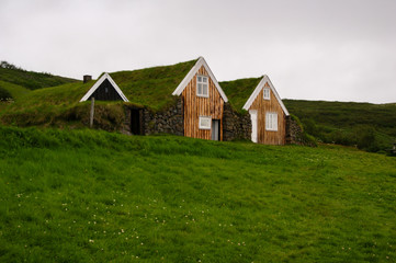 Fototapeta na wymiar Icelandic traditional house covered with grass, in southern Iceland