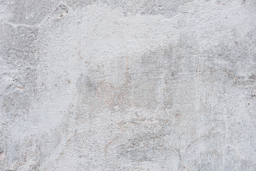 Wall fragment with scratches and cracks