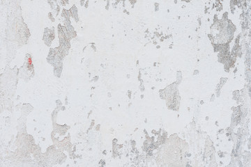Wall fragment with scratches and cracks