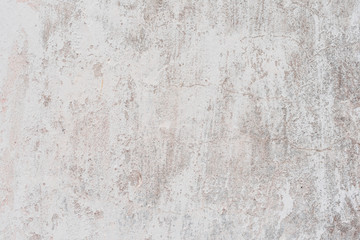 Wall fragment with scratches and cracks