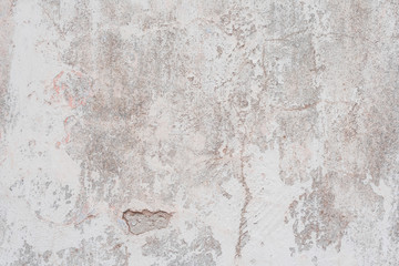 Wall fragment with scratches and cracks