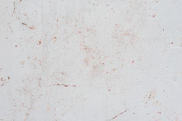 Wall fragment with scratches and cracks