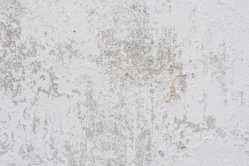 Wall fragment with scratches and cracks