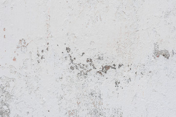 Wall fragment with scratches and cracks