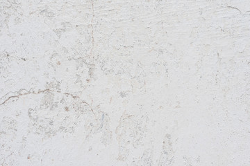 Wall fragment with scratches and cracks