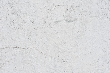 Wall fragment with scratches and cracks