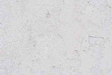 Wall fragment with scratches and cracks