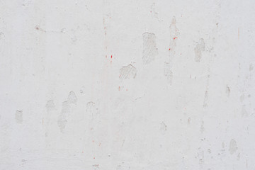 Wall fragment with scratches and cracks