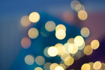 Obraz premium Abstract Yellow Bokeh Circles on Blurred Background