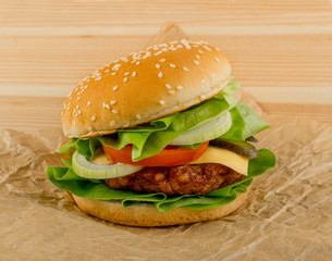 Burger with Roast Beef, Cheese and Fresh Green Lettuce Salad