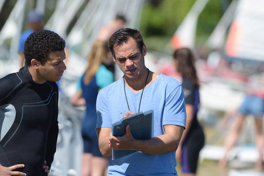 surfer listening to his coach