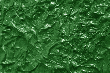 Metal foil texture in green color.