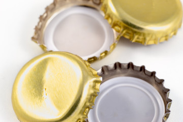 close up of a bottle metal cap on white background