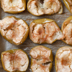 Flat-lay of baked apples. baked halves of apples with honey, cinnamon . top view 