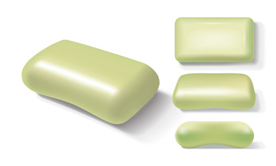 yellow soap from different sides on a white background