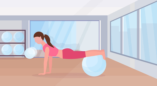 sporty woman doing exercises with fitness ball girl training in gym aerobic pilates workout healthy lifestyle concept flat modern health club studio interior horizontal