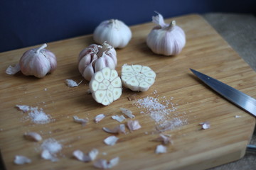 ingredients for pilaf on a wooden Board with a knife
