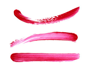 Red lipstick or acrylic paint isolated on white