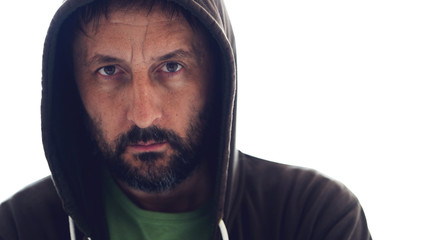 Portrait of adult bearded male wearing hoodie