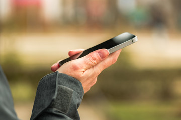 Woman using smartphone outdoors