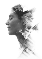 Paintography. Double exposure portrait of a young woman’s profile combined with handmade painting...