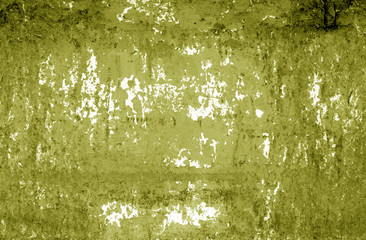 Grungy rusted metal wall texture in yellow tone.
