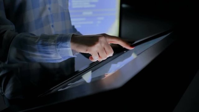 Education and technology concept - woman using interactive touchscreen display of electronic kiosk at modern history museum