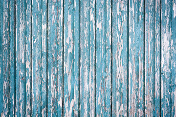 Fototapeta na wymiar Alte verwitterte blaue Holzbretter mit Struktur als Hintergrund