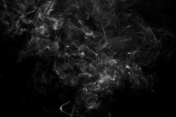 white smoke flame on a black background