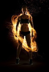 Sport. Dramatic portrait of professional bodybuilder. Winner in a competition. Fire and energy.