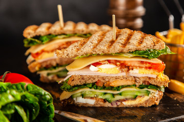 Tall club sandwich and french fries - 258916810