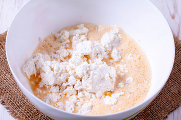 Cooking cottage cheese dough for baking pancakes
