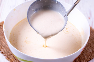 Making dough for baking pancakes