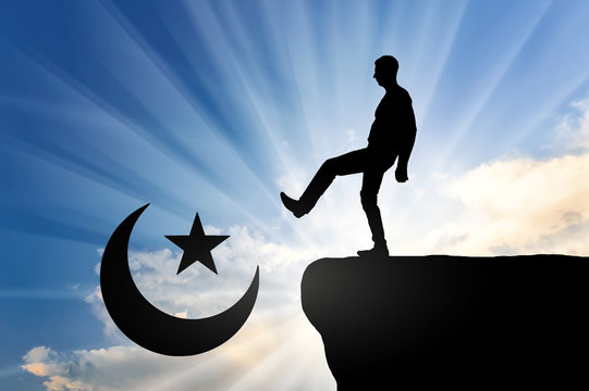 Man atheist pushes symbol of islam into cliff