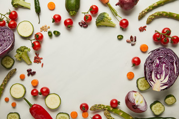 Flay lay with vegetables and seeds on white surface