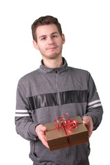 Young man holding a gift box.