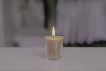Obraz na płótnie Canvas Candles placed on the table